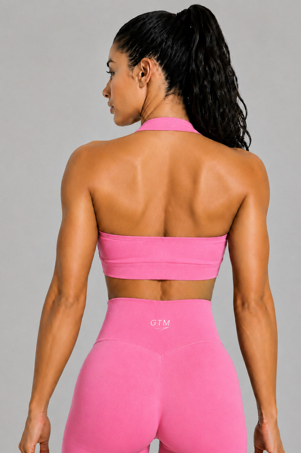 TOP CORTO DEPORTIVO GOAT ROSA MAGENTA